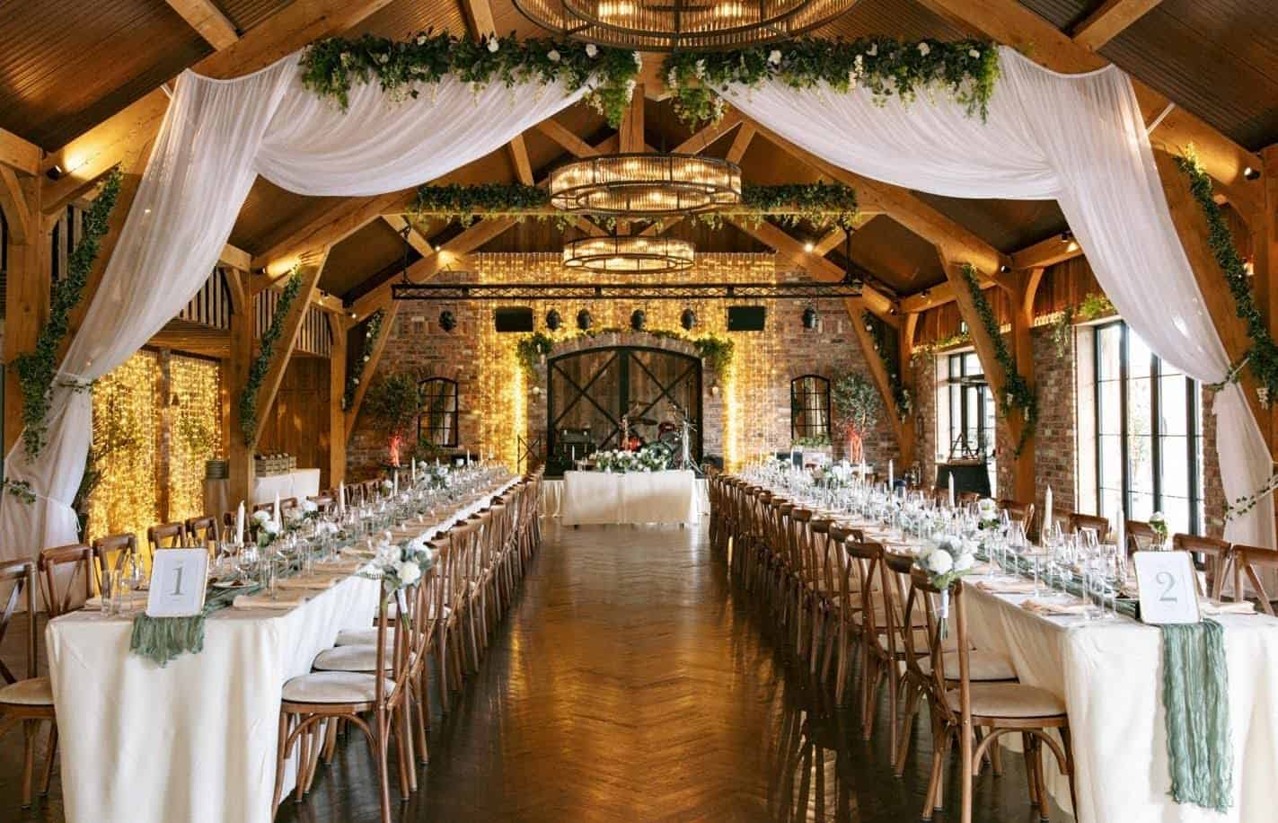 Wedding dinner inside the rustic Events Barn at Drumhierny Woodland Hideaway
